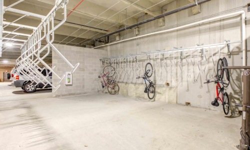 a group of bicycles parked in a garage